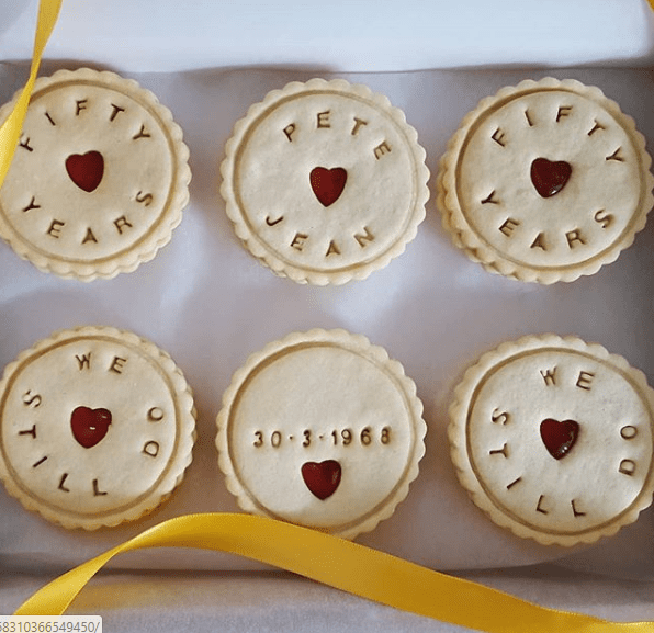 Wedding anniversary biscuits by BLoom Bakers